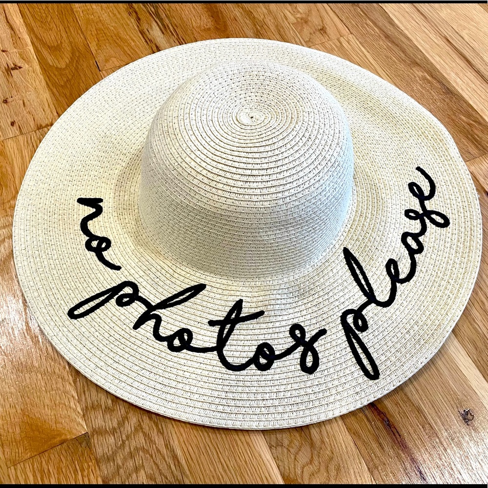 David and Young sun hat. “No photos please”